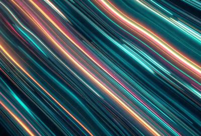 The primary subject of the image is a blue and pink light streak, which appears to be a digital art or illustration. The setting is a dark background, and the visual style is a combination of digital art and light streaks. The colors and mood of the image are predominantly blue and pink, creating a vibrant and dynamic atmosphere.