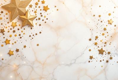 The primary subject of the image is a marble countertop with a pattern of gold stars on it. The setting is a white marble countertop, and the visual style is a close-up of the marble surface. The colors and mood of the image are predominantly white and gold, creating a warm and elegant atmosphere.