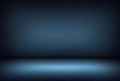 The primary subject of the image is a blue wall. The setting is a dark room, and the visual style is a photo. The dominant colors are blue and black, creating a moody atmosphere.