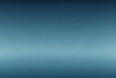 The primary subject of the image is a large, dark blue sky. The setting is a vast, open space with no visible landmarks or objects. The visual style is a natural, untouched landscape. The colors and mood are predominantly dark and moody, with the blue sky serving as the main focal point.