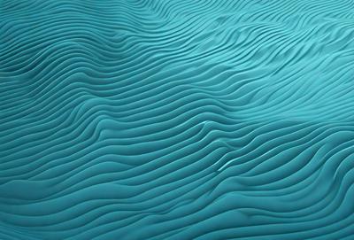 The primary subject of the image is a large body of blue water with a rippling surface. The water appears to be a deep blue color, and it is the main focus of the image. The setting is a vast body of water, and the visual style is a close-up of the water's surface. The colors and mood of the image are serene and calming, with the deep blue color evoking a sense of tranquility.