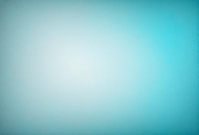 The primary subject of the image is a large, empty, and blue sky. The setting is a vast, open space with no visible landmarks or objects. The visual style is a natural, outdoor scene with a focus on the sky. The colors and mood are predominantly blue, creating a calm and serene atmosphere.