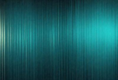 The primary subject of the image is a blue and green striped wallpaper. The setting is a room with a blue and green striped wallpaper covering the walls. The visual style is a patterned wallpaper, which gives the room a unique and colorful atmosphere.