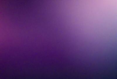 The primary subject of the image is a purple wall. The setting is a room with a purple wall, and the visual style is a photo. The dominant colors in the image are purple and blue, creating a calm and serene atmosphere.