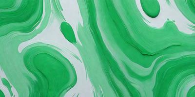 The primary subject of the image is a green painting or drawing, featuring a leafy design. The setting is a white background, which provides a clean and uncluttered appearance. The visual style is a combination of painting and drawing, creating a unique and artistic representation. The colors and mood of the image are predominantly green, giving it a fresh and lively atmosphere.