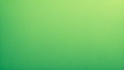 The primary subject of the image is a large, bright green wall. The setting is a plain, empty room with no other objects or people visible. The visual style is a close-up of the green wall, which gives a sense of depth and texture to the image. The colors and mood are predominantly green, creating a calm and serene atmosphere.
