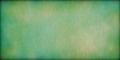 The primary subject of the image is a green background. The setting is a large, empty space with no visible objects or people. The visual style is a close-up of the green background, which appears to be a piece of paper or a textured surface. The colors and mood of the image are predominantly green, creating a calm and serene atmosphere.
