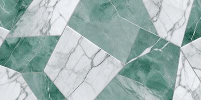 The primary subject of the image is a marble tile with a green and white pattern. The setting is a bathroom, as indicated by the presence of a marble countertop. The visual style is a close-up of the marble tile, showcasing its intricate design. The colors and mood of the image are predominantly green and white, giving it a clean and elegant appearance.