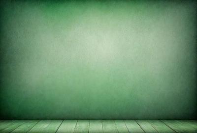 The primary subject of the image is a green wall with a green floor. The setting is a room with a green wall and a green floor. The visual style is a photo of a green wall and floor. The colors and mood are predominantly green, creating a calm and soothing atmosphere.