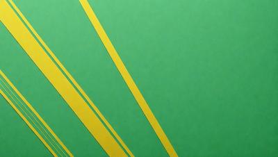 The primary subject of the image is a green and yellow striped pattern. The setting is a green background, and the visual style appears to be a digital art or illustration. The dominant colors are green and yellow, creating a lively and vibrant atmosphere.