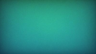 The primary subject of the image is a large, dark blue background. The setting is a simple, uncluttered space with no visible objects or people. The visual style is a close-up of the blue background, which gives the image a clean and minimalist appearance. The colors and mood of the image are predominantly dark and moody, with the blue background creating a sense of depth and mystery.