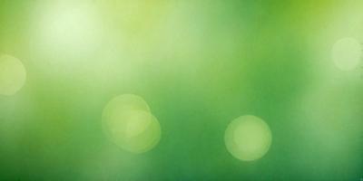 The primary subject of the image is a green background with a few green circles. The setting is a lush green environment, possibly a forest or a field. The visual style is a combination of a photo and a digital art, illustration, or drawing. The colors and mood are predominantly green, creating a serene and natural atmosphere.