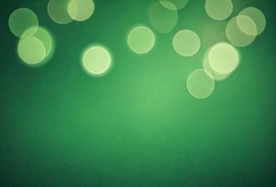 The primary subject of the image is a green background with a pattern of green lights. The setting is a dark room, and the visual style appears to be a digital art or illustration. The dominant colors are green, and the overall atmosphere is calm and serene.