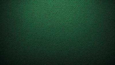 The primary subject of the image is a green fabric with a pattern of interlocking diamonds. The setting is a close-up of the fabric, showcasing the intricate design. The visual style is a detailed, textured representation of the fabric. The colors and mood are predominantly green, with a sense of depth and complexity in the pattern.