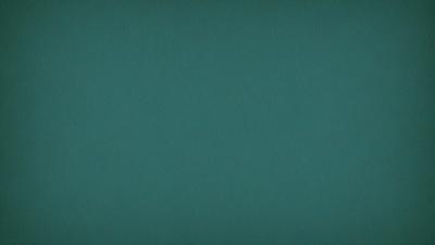 The primary subject of the image is a large, empty, and dark blue canvas. The setting is a blank, unoccupied space, with no visible background or objects. The visual style is a simple, unadorned representation of the canvas. The colors and mood are predominantly dark and moody, with the blue color being the most prominent.
