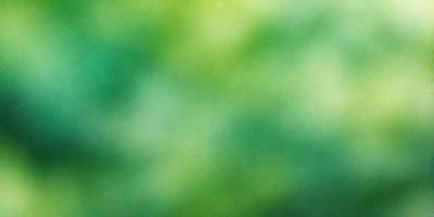 The primary subject of the image is a close-up of a green leaf. The setting is a lush green forest, with the leaf being the main focus of the scene. The visual style is a digital art or illustration, as the leaf appears to be a part of a larger image. The colors and mood of the image are predominantly green, creating a serene and natural atmosphere.