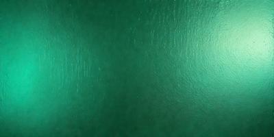 The primary subject of the image is a green wall. The setting is a room with a green wall, and the visual style is a photo. The dominant colors are green, and the overall atmosphere is calm and serene.