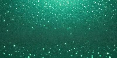 The primary subject of the image is a close-up of a green background with a pattern of glittering stars. The setting appears to be a dark room, and the visual style is a combination of a photo and digital art. The dominant colors are green and white, creating a calm and serene atmosphere.