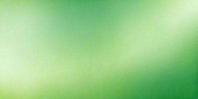 The primary subject of the image is a large, bright green background. The setting is a simple, uncluttered environment, with no visible objects or people. The visual style is a close-up of the green background, which gives the image a clean and minimalist appearance. The colors and mood of the image are predominantly green, creating a calm and serene atmosphere.