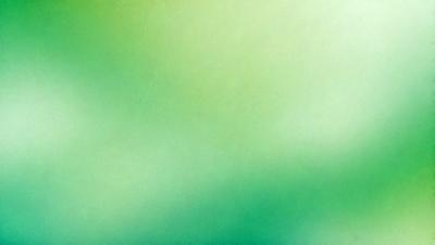 The primary subject of the image is a green background, which appears to be a pattern or a texture. The setting or background is a green environment, possibly a forest or a field. The visual style of the image is a close-up of the green background, which gives it a unique and artistic appearance. The colors and mood of the image are predominantly green, creating a calm and serene atmosphere.