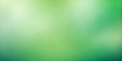 The primary subject of the image is a large, bright green background. The setting is a simple, uncluttered environment, with no visible objects or people. The visual style is a close-up of the green background, which gives the image a clean and fresh appearance. The colors and mood are predominantly green, creating a sense of calmness and tranquility.