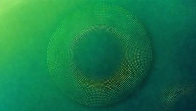 The primary subject of the image is a large, circular, green object with a pattern of small circles on it. The setting is a dark, blue background, which contrasts with the bright green object. The visual style appears to be a combination of a photo and a digital art or illustration, as the object has a unique, intricate design. The colors and mood of the image are predominantly dark and moody, with the green object standing out as the focal point.