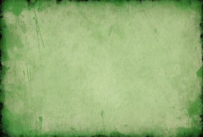 The primary subject of the image is a green wall with a green background. The visual style appears to be a photo, and the colors and mood are predominantly green, creating a calm and serene atmosphere.