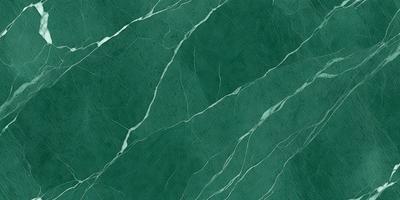 The image features a green marble wall with a pattern of white lines. The wall appears to be made of marble, giving it a luxurious and elegant appearance. The white lines on the green marble create a visually appealing contrast, adding depth and interest to the wall. The overall atmosphere of the image is sophisticated and stylish.