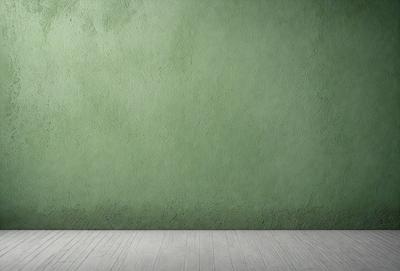 The primary subject of the image is a green wall. The setting is a room with a wooden floor. The visual style is a photo, and the dominant colors are green and white. The overall atmosphere is calm and serene.