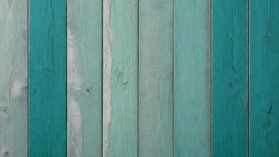 The primary subject of the image is a wooden wall with a blue color. The setting is a room with a blue wall, and the visual style is a photo. The dominant colors are blue and green, creating a calm and soothing atmosphere.