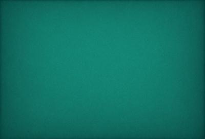 The primary subject of the image is a large, dark blue tablecloth. The setting is a dark blue table, and the visual style is a close-up of the tablecloth. The colors and mood of the image are predominantly dark blue, creating a calm and serene atmosphere.