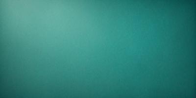The primary subject of the image is a large, bright green wall. The setting is a room with a blue background, which creates a contrasting and vibrant atmosphere. The visual style is a close-up of the green wall, showcasing its color and texture. The dominant colors are green and blue, with the green wall being the main focus of the image.
