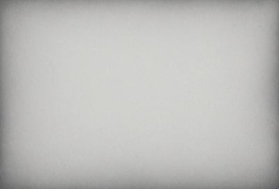 The image is a white background with a texture, possibly a paper or canvas texture. The primary subject is a large white sheet of paper or canvas, which is the main focus of the image. The setting is a plain, empty space, with no other objects or background visible. The visual style is a close-up of the white background, emphasizing the texture and the subject. The colors and mood are predominantly white, giving the image a clean and minimalist appearance.