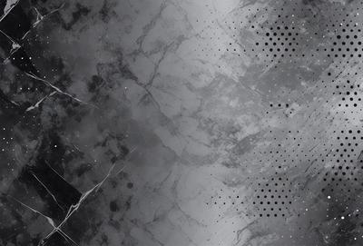 The primary subject of the image is a marble-like surface with a pattern of dots. The setting is a black and white background, which gives the image a classic and timeless appearance. The visual style is a combination of a photo and digital art, creating a unique and intriguing visual effect. The colors and mood of the image are predominantly black and white, with the dots adding a touch of contrast and interest.