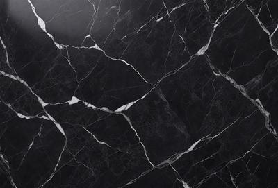The primary subject of the image is a black marble countertop with a white pattern. The setting is a kitchen, and the visual style is a close-up of the marble countertop. The dominant colors are black and white, creating a sleek and modern atmosphere.