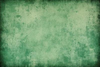 The primary subject of the image is a green wall with a mottled texture. The setting is a room with a green wall, and the visual style is a photo. The dominant colors are green and white, creating a calm and soothing atmosphere.