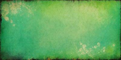 The primary subject of the image is a green background, which appears to be a painting or a drawing. The setting is a large, open space with a vibrant green color. The visual style is artistic, with a focus on the green hue. The colors and mood of the image are lively and energetic, creating a sense of freshness and vitality.