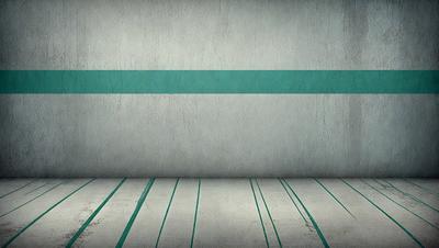 The primary subject of the image is a wall with a green and white striped pattern. The setting is a room with a concrete wall, and the visual style is a photo. The colors and mood of the image are predominantly green and white, creating a clean and modern atmosphere.