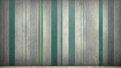The primary subject of the image is a wall with a striped pattern. The setting is a room with a wooden floor. The visual style is a combination of photo and digital art, creating a unique and interesting design. The dominant colors are green and white, giving the wall a fresh and clean appearance.