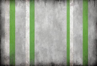 The primary subject of the image is a green and white striped wall. The setting is a concrete wall, and the visual style is a photo. The dominant colors are green and white, creating a clean and modern atmosphere.