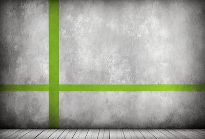 The primary subject of the image is a green and white wall. The setting is a room with a concrete wall, and the visual style is a photo. The dominant colors are green and white, creating a calm and soothing atmosphere.