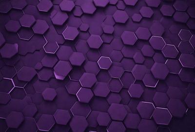 The primary subject of the image is a purple wall with a pattern of hexagons. The setting is a room with a purple background, and the visual style is a close-up of the purple wall. The dominant colors are purple and the hexagons, creating a calm and soothing atmosphere.