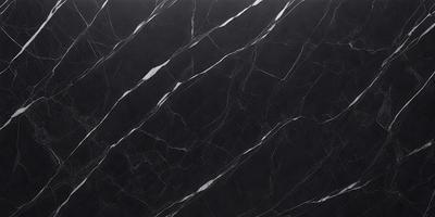 The primary subject of the image is a marble countertop with a black and white pattern. The setting is a kitchen, and the visual style is a close-up of the marble countertop. The colors and mood of the image are predominantly black and white, giving it a classic and elegant appearance.