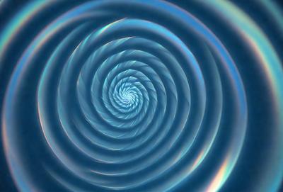 The primary subject of the image is a spiral pattern, which is the main object, scene, or focus of the image. The spiral pattern is set against a blue background, creating a visually striking contrast. The spiral pattern is a digital art piece, showcasing the artist's skill in creating intricate designs. The overall atmosphere of the image is vibrant and dynamic, with the spiral pattern serving as the central point of interest.