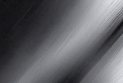 The primary subject of the image is a black and white photograph of a long, thin, and curved line. The setting is a dark background, which contrasts with the line. The visual style is a black and white photo, giving it a classic and timeless appearance. The colors and mood of the image are predominantly dark and moody, with the line being the main focal point.