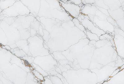The primary subject of the image is a marble surface, which is the main object, scene, or focus of the image. The setting is a white marble wall, and the visual style is a photo. The colors and mood of the image are predominantly white, giving it a clean and elegant appearance.