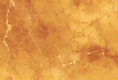 The primary subject of the image is a close-up of a marble wall with a yellowish hue. The setting is a room with a yellowish marble wall, which serves as the background. The visual style is a close-up of the marble wall, showcasing its texture and color. The dominant colors are yellow and brown, creating a warm and natural atmosphere.