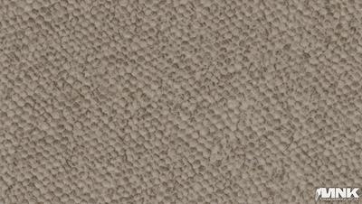 The primary subject of the image is a close-up of a textured surface, possibly a carpet or a wall, with a pattern of small white balls. The setting appears to be indoors, and the visual style is a close-up of the textured surface. The colors and mood of the image are predominantly white, giving it a clean and simple appearance.