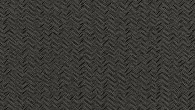 The primary subject of the image is a close-up of a black and white patterned fabric. The setting is a dark background, which contrasts with the patterned fabric. The visual style is a close-up of the fabric, showcasing its intricate design. The colors and mood of the image are predominantly black and white, giving it a classic and timeless appearance.