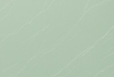 The primary subject of the image is a close-up of a green wall with a pattern of white lines. The setting is a room with a green wall, and the visual style is a photo. The dominant colors are green and white, creating a calm and soothing atmosphere.